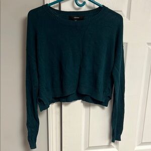 A. Teal Cropped Sweater